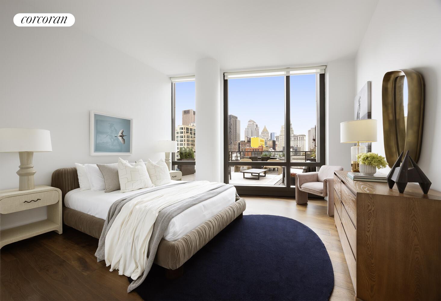 101 Warren Street, Unit 1450 Manhattan, NY 10007 - Photo 9 of 20 a bedroom with a bed couch and large window