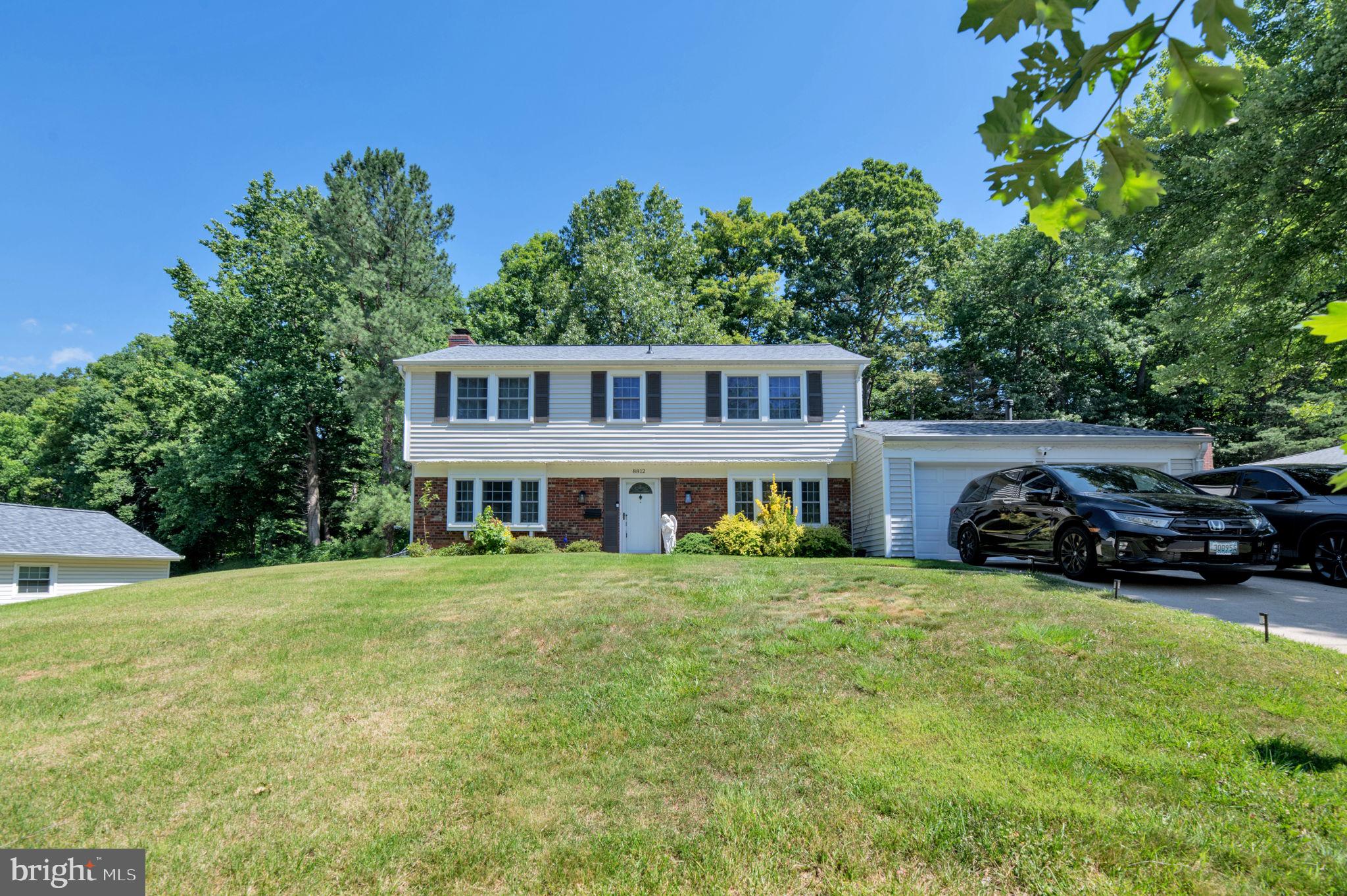 8812 Churchfield Lane Laurel, MD 20708 - Photo 30 of 31 a view of a house with yard and sitting area
