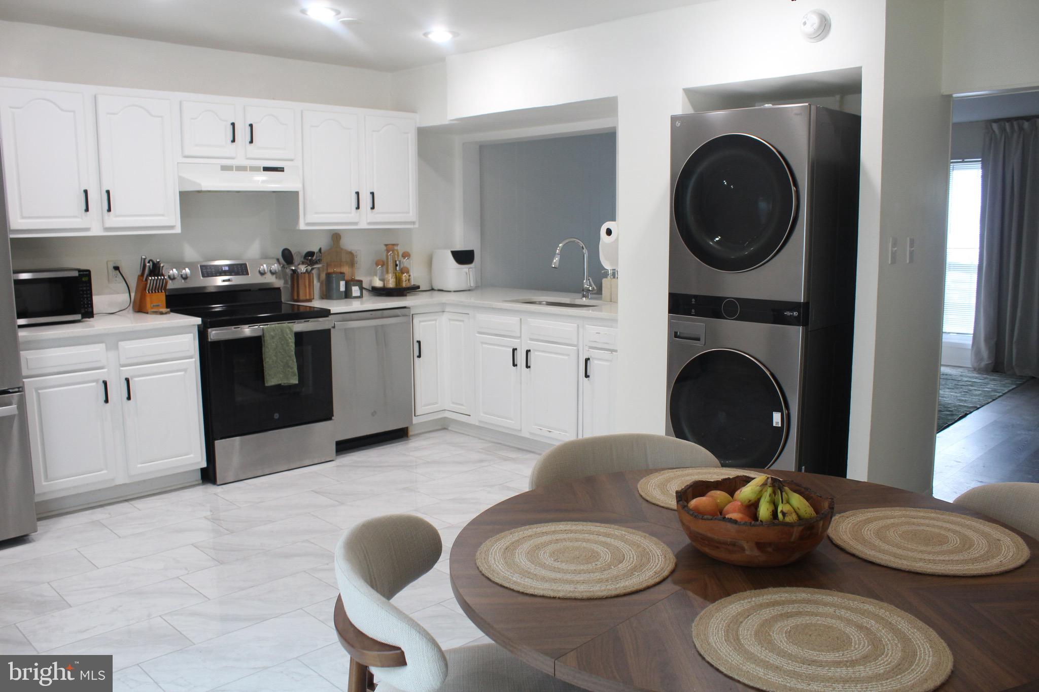 8829 Trimble Way Rosedale, MD 21237 - Photo 4 of 15 HUGE Kitchen w/ GORGEOUS new flooring!