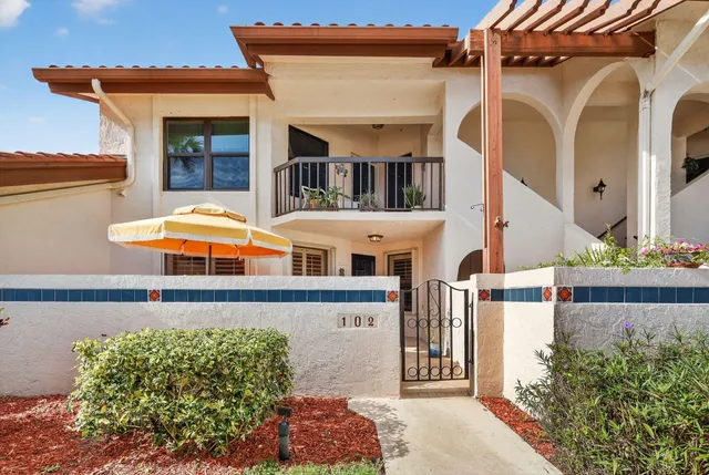 front view of a house with a street
