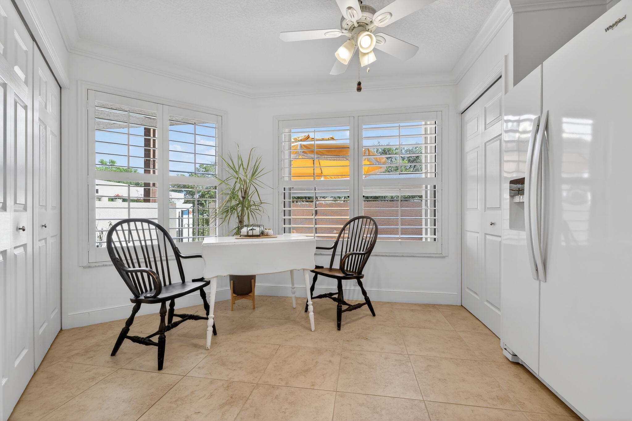 3401 Southeast Martinique Trace, Unit 102 Stuart, FL 34997 - Photo 8 of 56 a view of a livingroom with furniture and windows