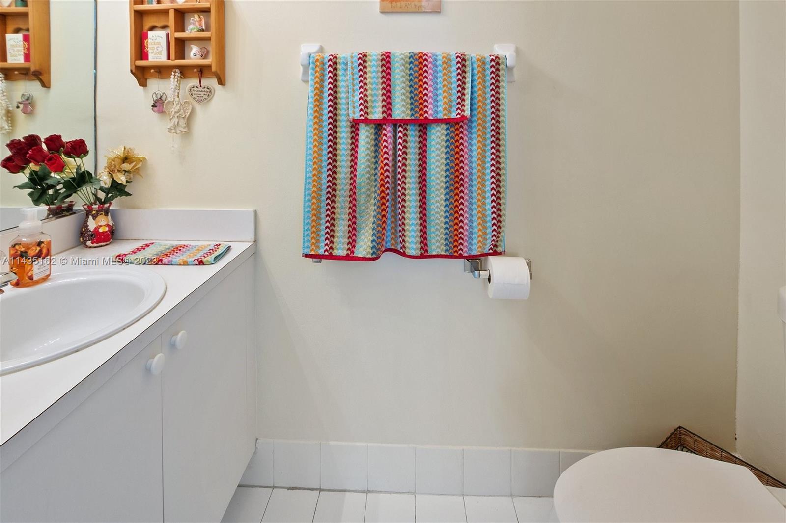 3165 Southwest 176th Way Miramar, FL 33029 - Photo 13 of 32 a bathroom with a bathtub sink and a toilet