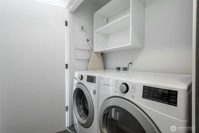 a utility room with dryer and washer