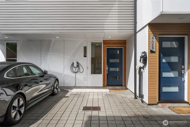 a view of a car park in front of house