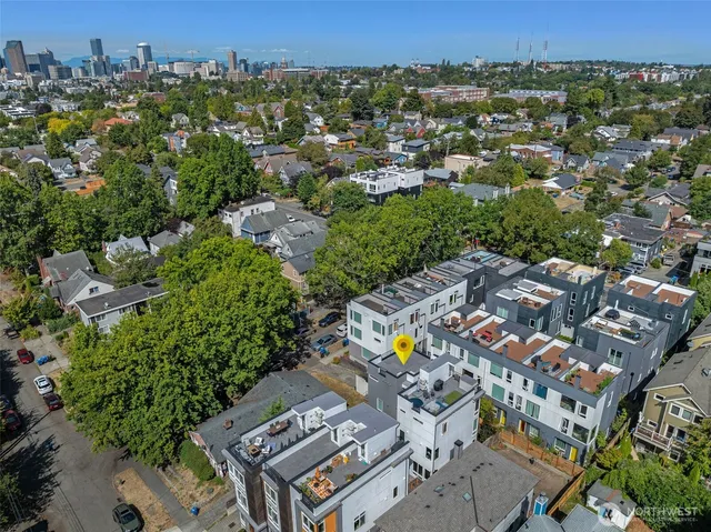 an aerial view of a city with lots of residential buildings