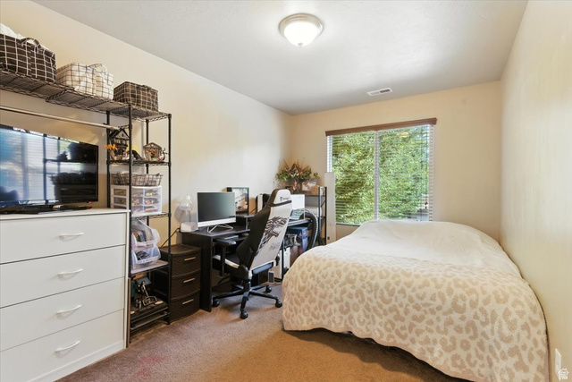 1187 Seraphim Court Layton, UT 84041 - Photo 10 of 18 Bedroom with a desk and light colored carpet