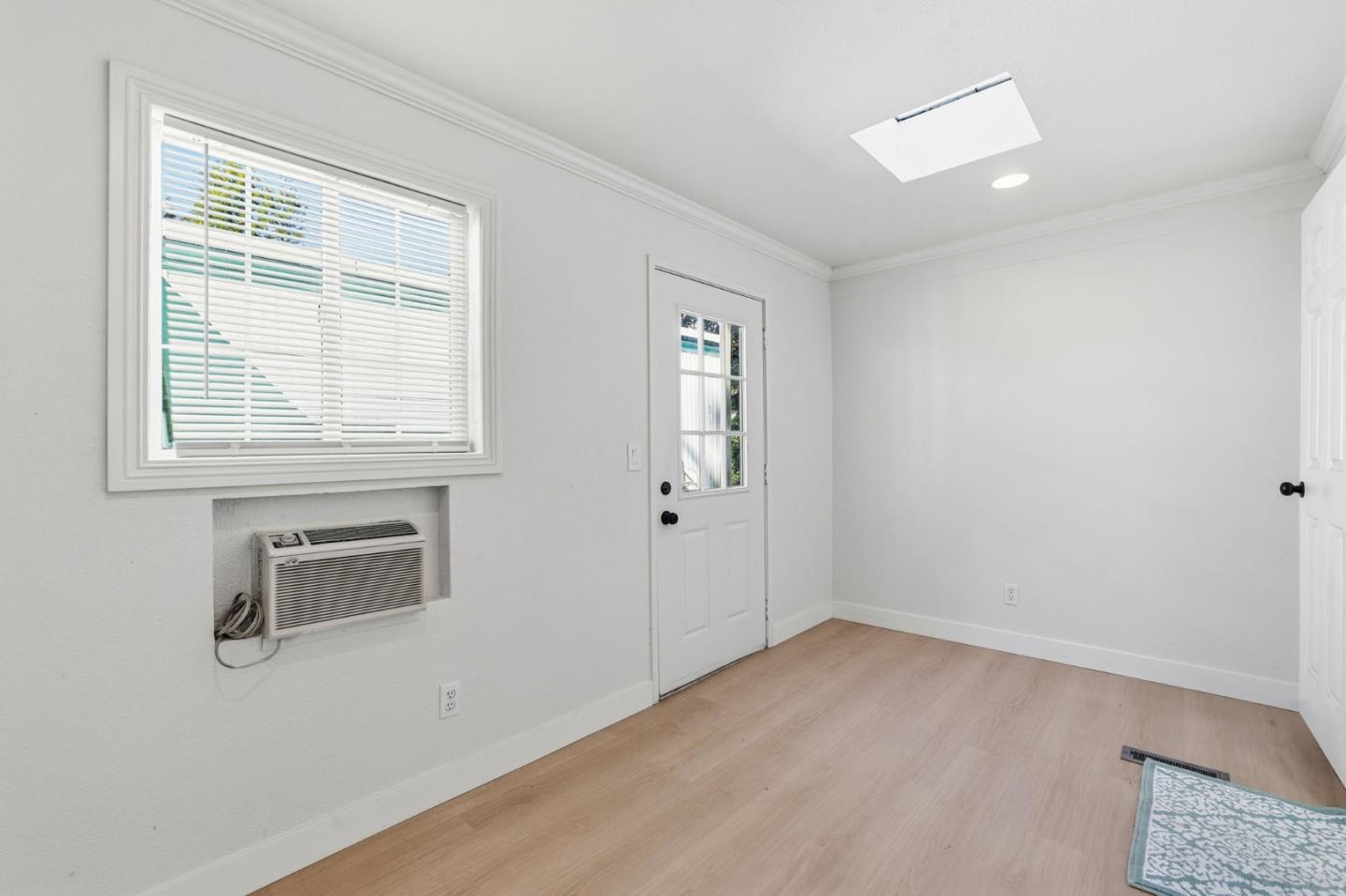 265 Brown Gables Road, Unit 11 Ben Lomond, CA 95005 - Photo 28 of 50 an empty room with windows