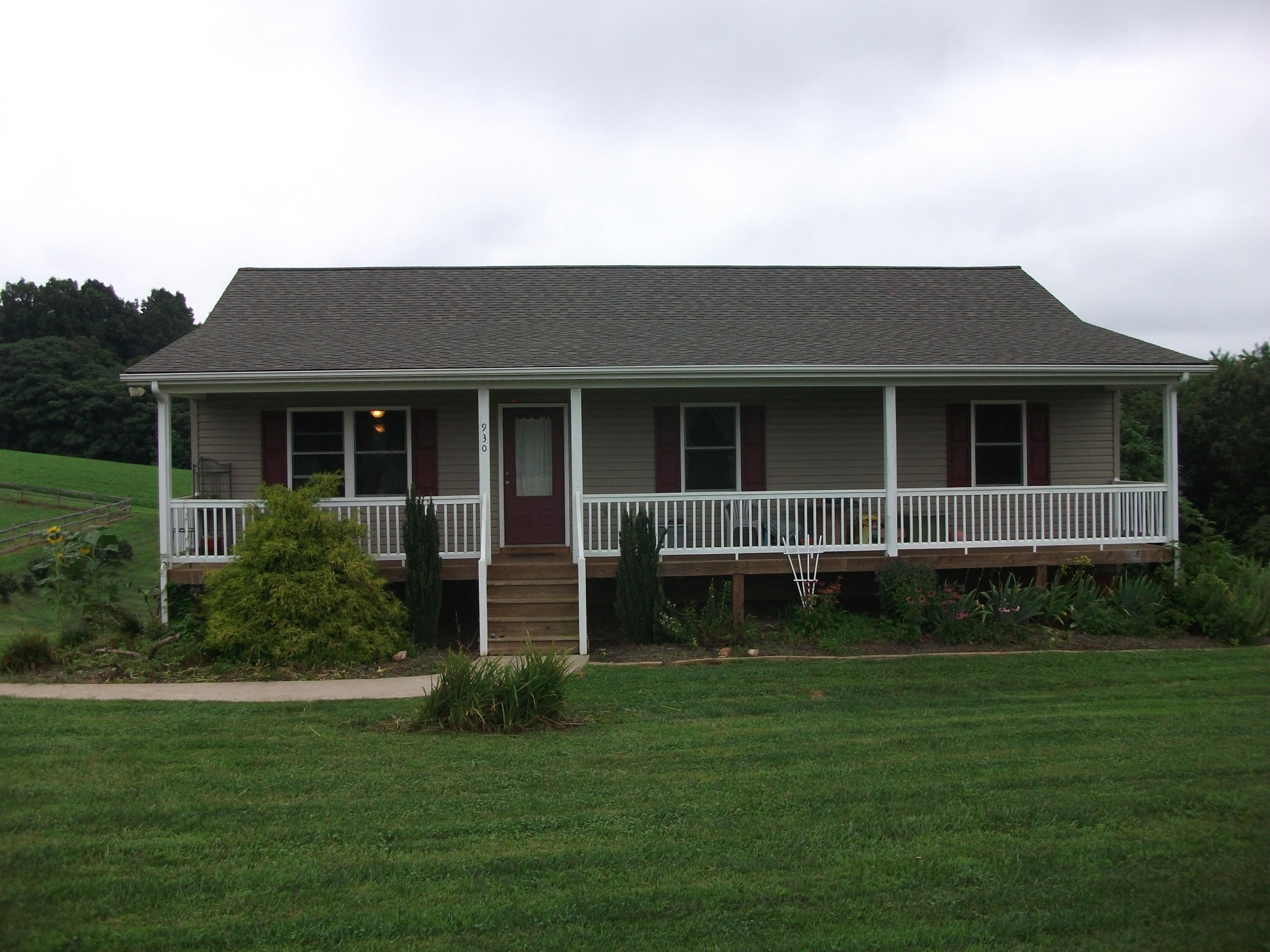 930 Calico Rock Road Rocky Mount, VA 24151 - Photo 1 of 34 a house view with a garden space
