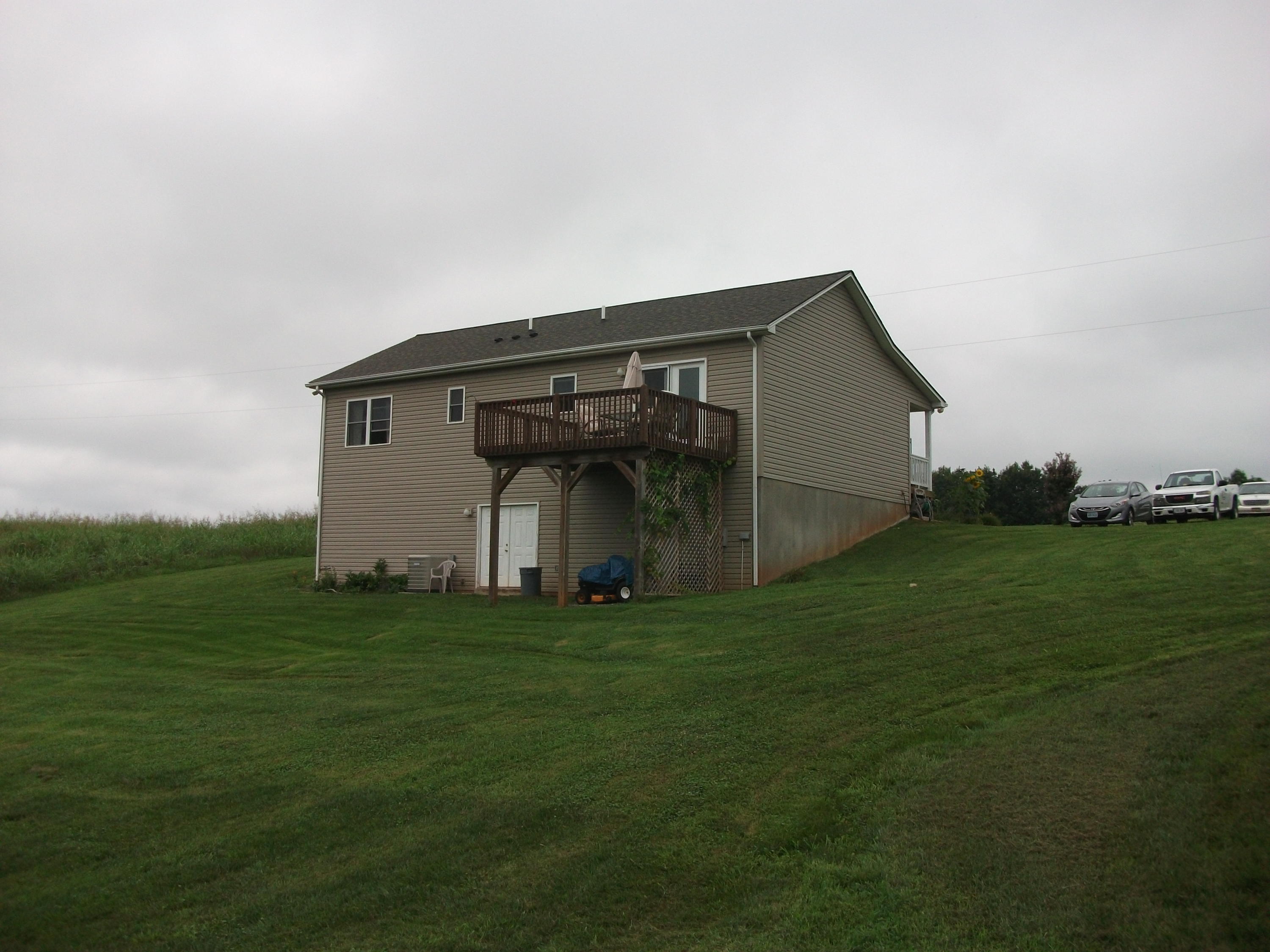 930 Calico Rock Road Rocky Mount, VA 24151 - Photo 2 of 34 a view of a back yard of the house