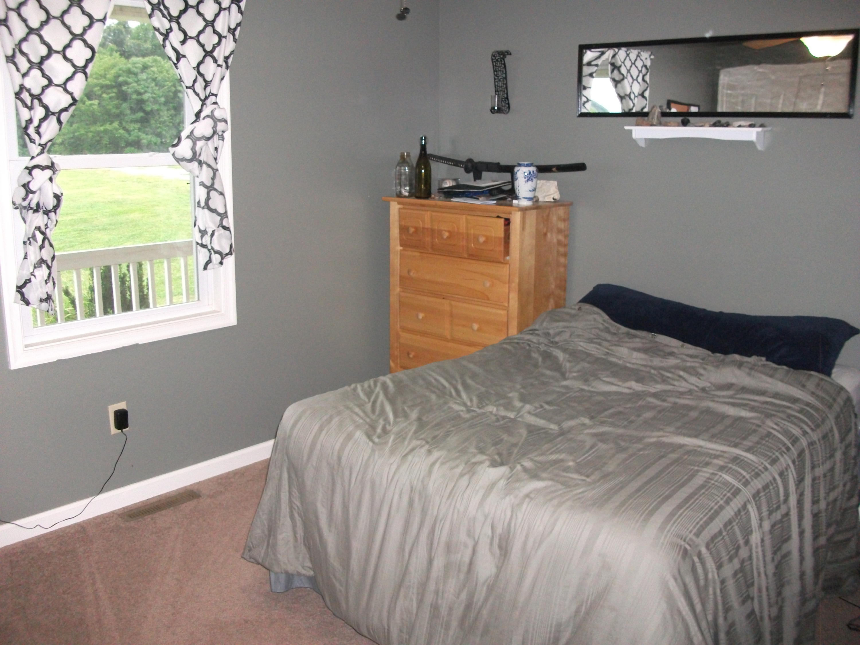 930 Calico Rock Road Rocky Mount, VA 24151 - Photo 15 of 34 a bedroom with a bed and a window