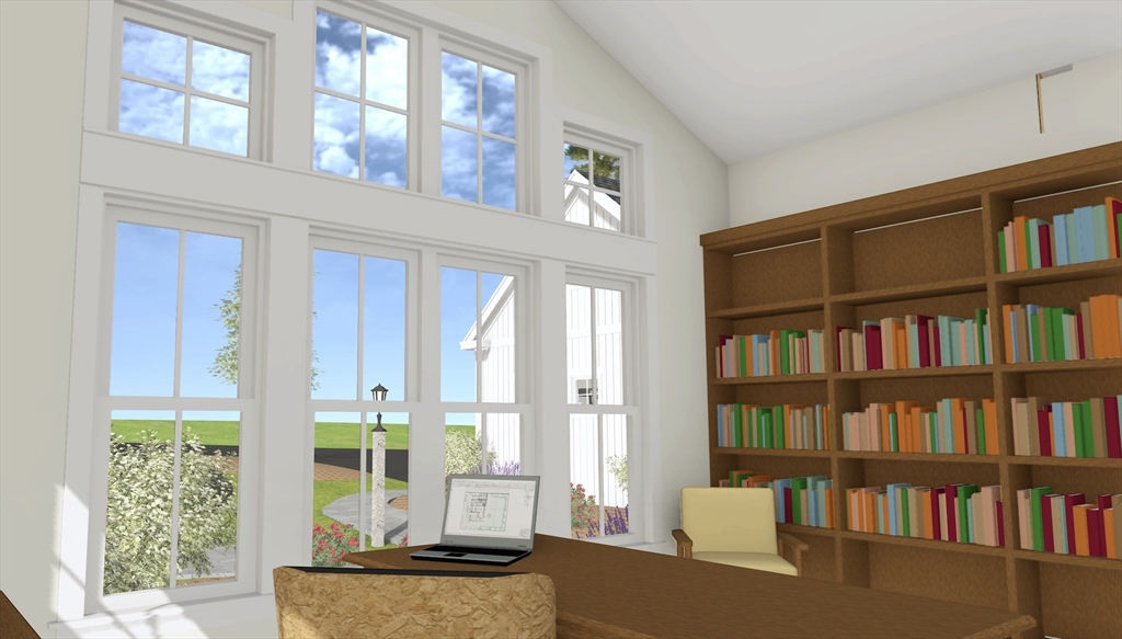 54 Prospect Hill Road Harvard, MA 01451 - Photo 6 of 17 a living room with large lots of furniture and a book shelf