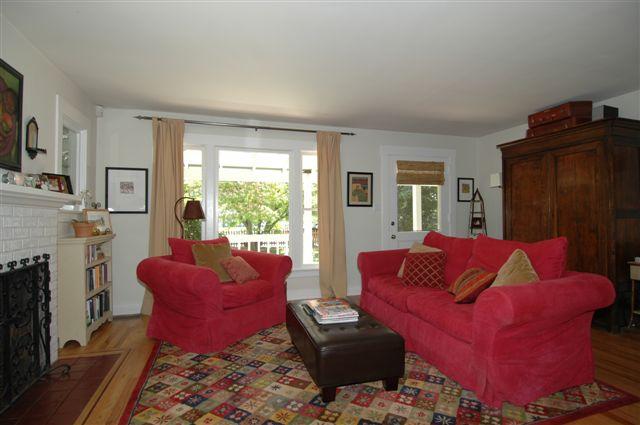 291 Gridley Road Ojai, CA 93023 - Photo 3 of 8 a living room with furniture a fireplace and a flat screen tv