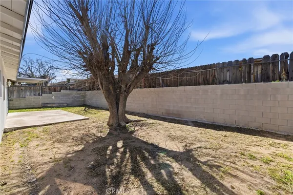 a view of a house with swimming pool in front of it