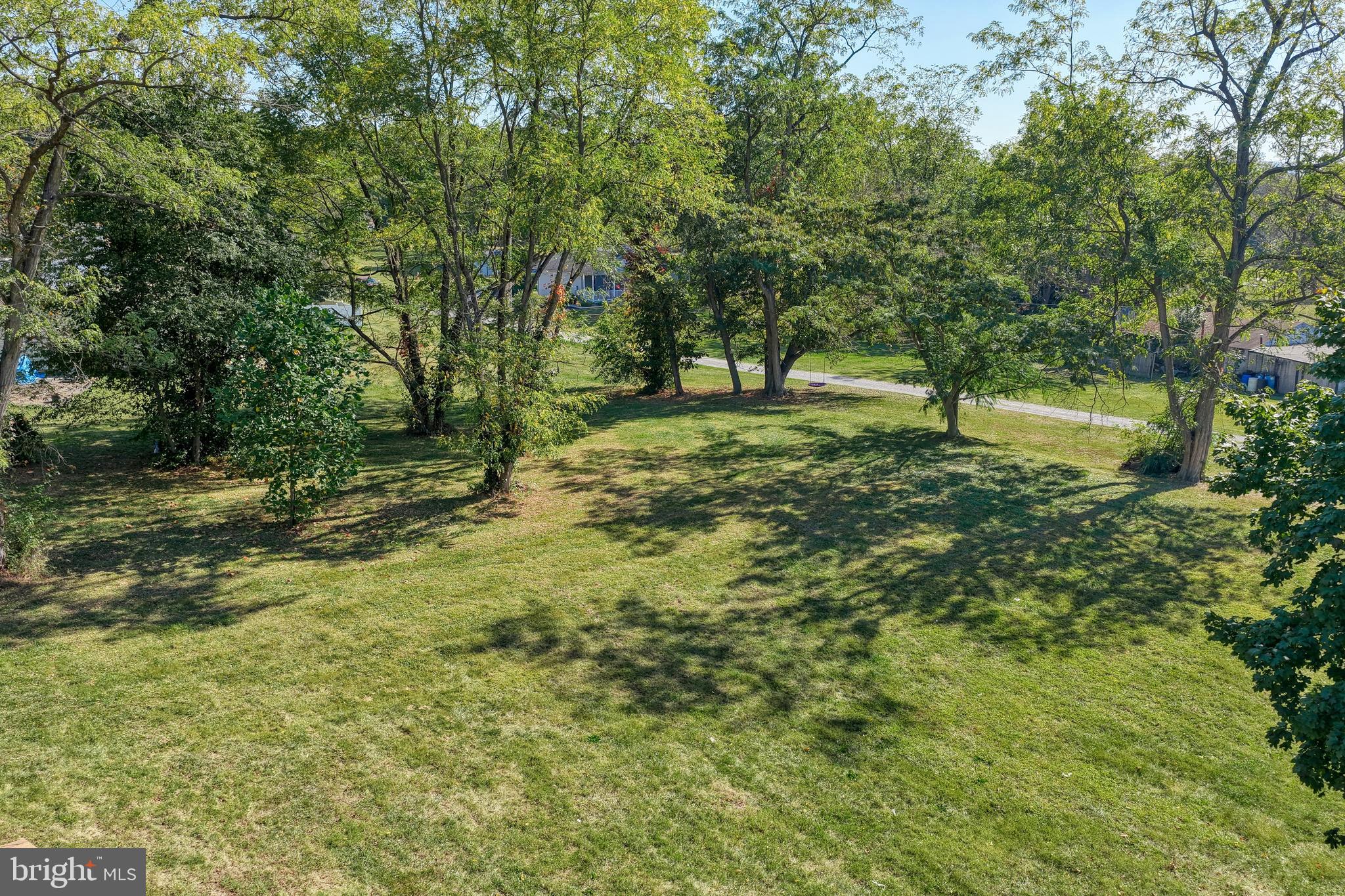455 Petersburg Road Carlisle, PA 17015 - Photo 18 of 77 a big yard with lots of green space and trees