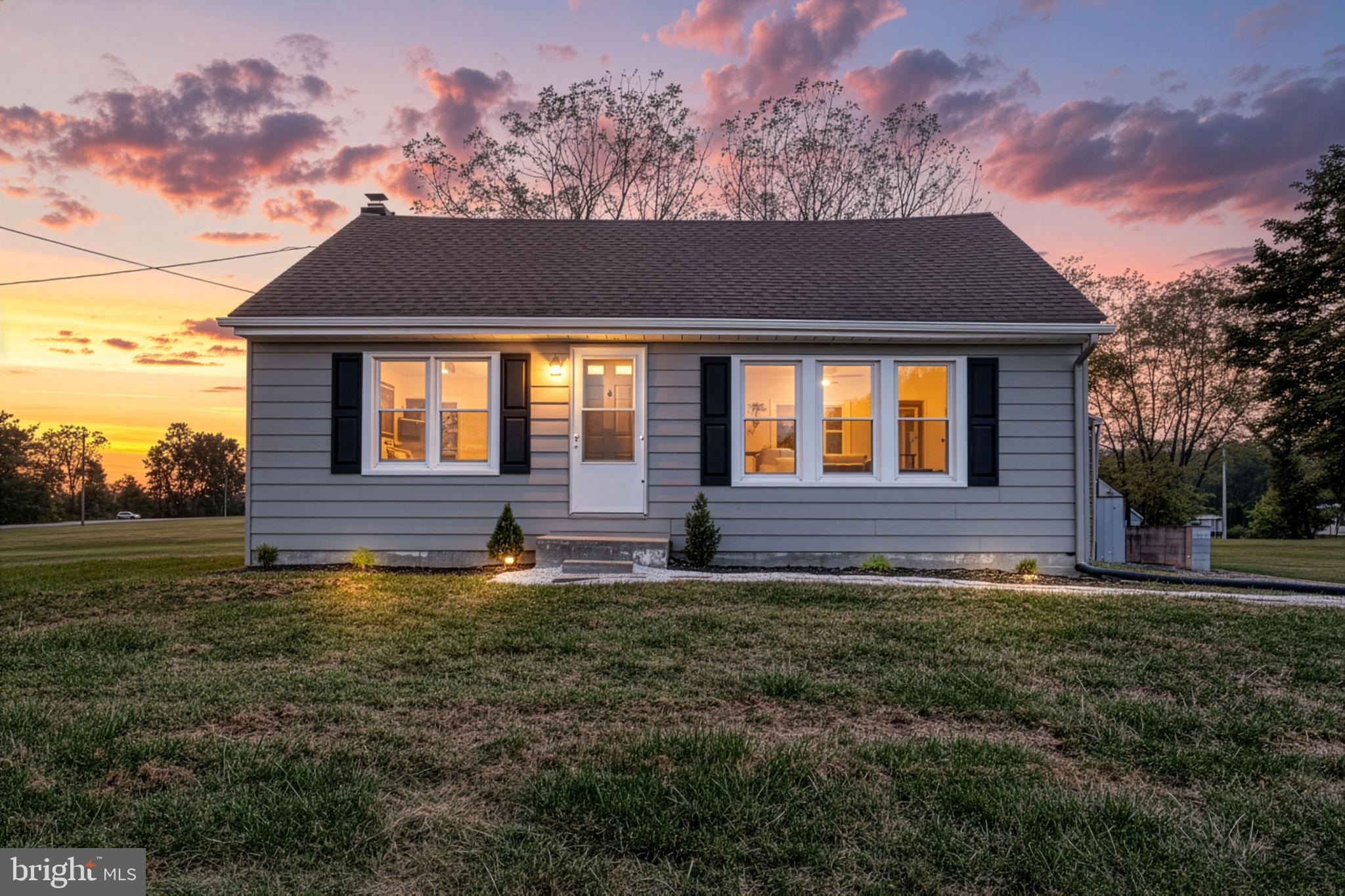 455 Petersburg Road Carlisle, PA 17015 - Photo 2 of 77 a front view of a house with a yard
