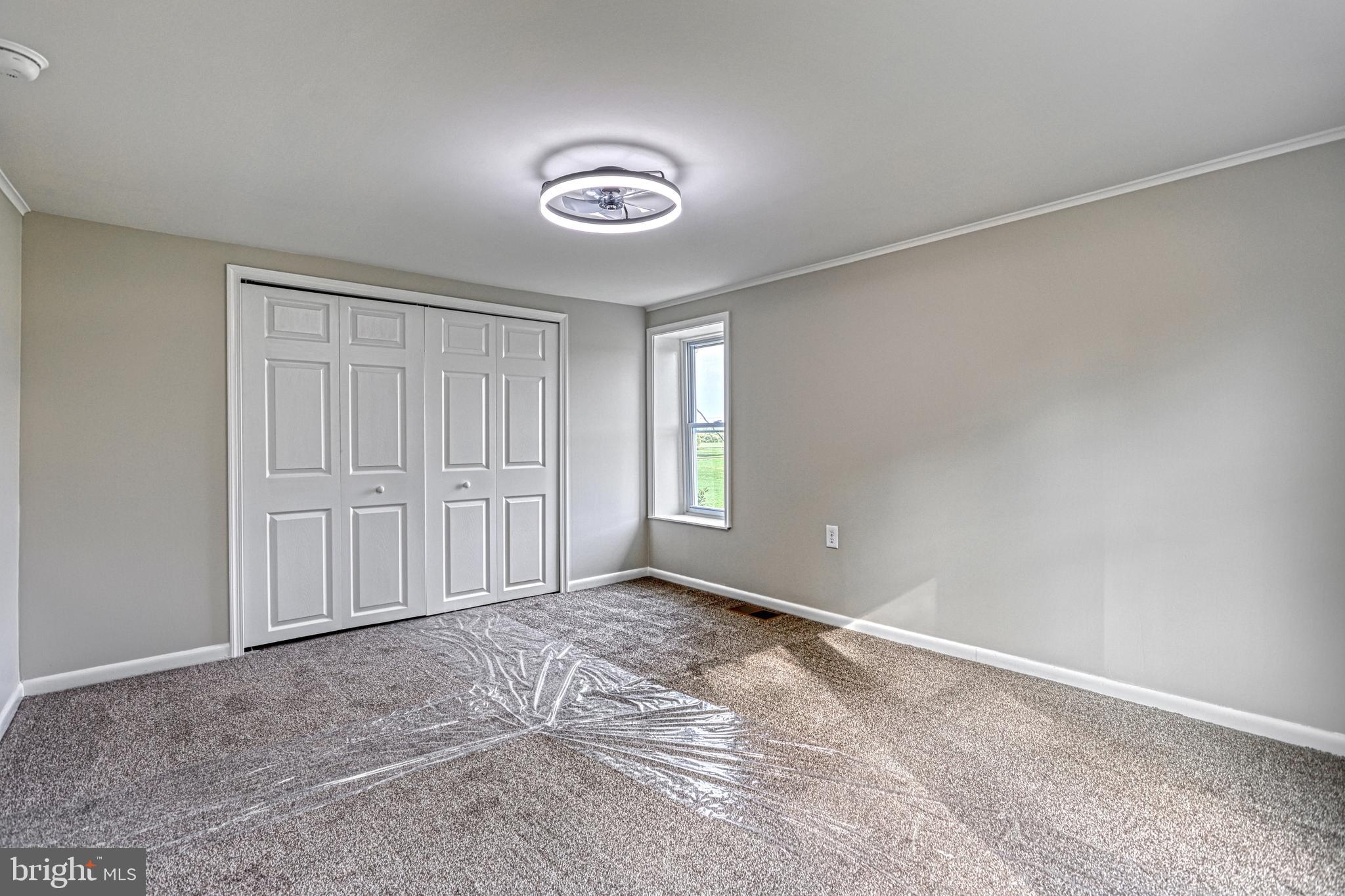 455 Petersburg Road Carlisle, PA 17015 - Photo 44 of 77 a view of an empty room with a window