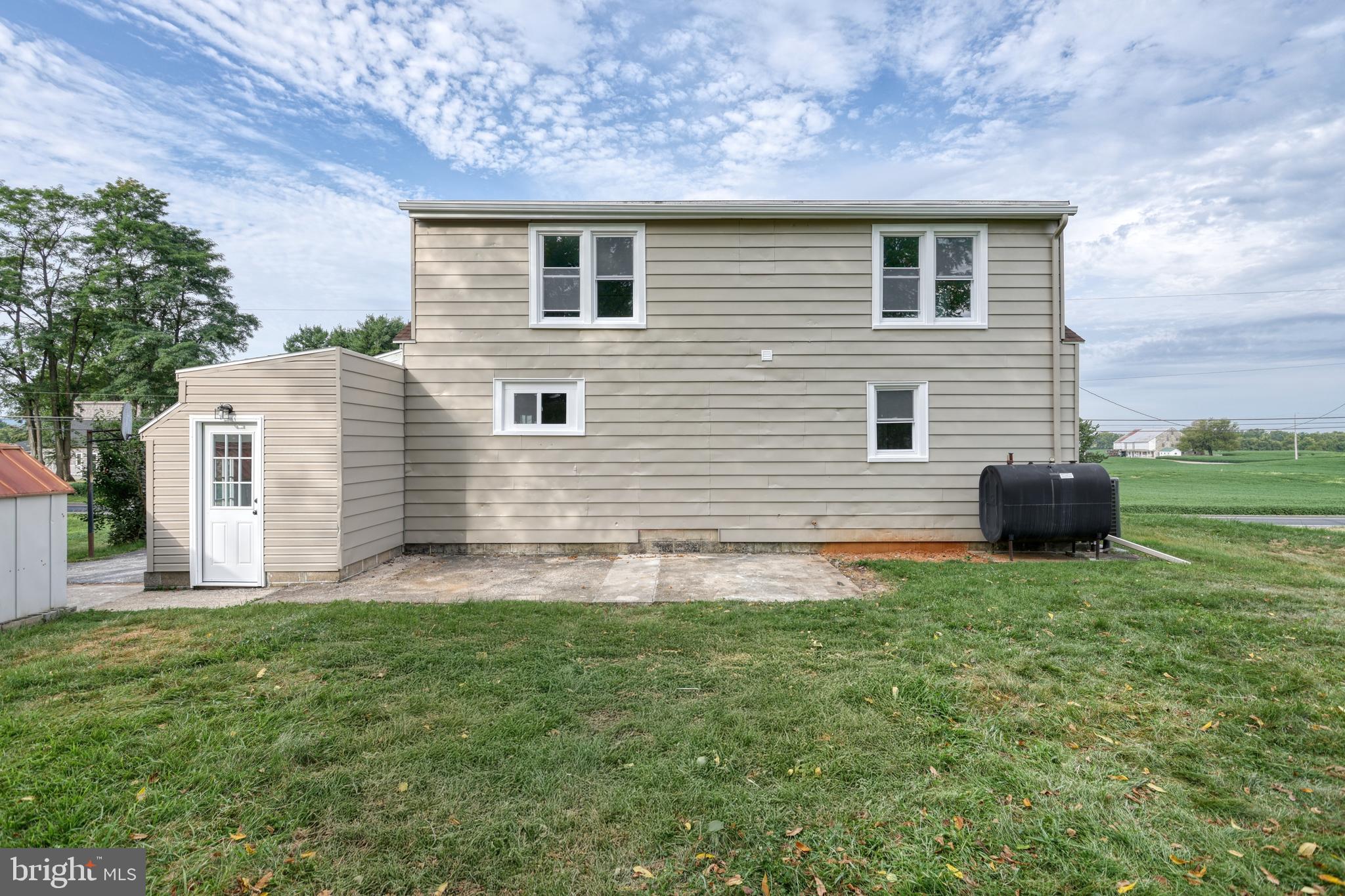 455 Petersburg Road Carlisle, PA 17015 - Photo 56 of 77 a backyard of a house with table and chairs
