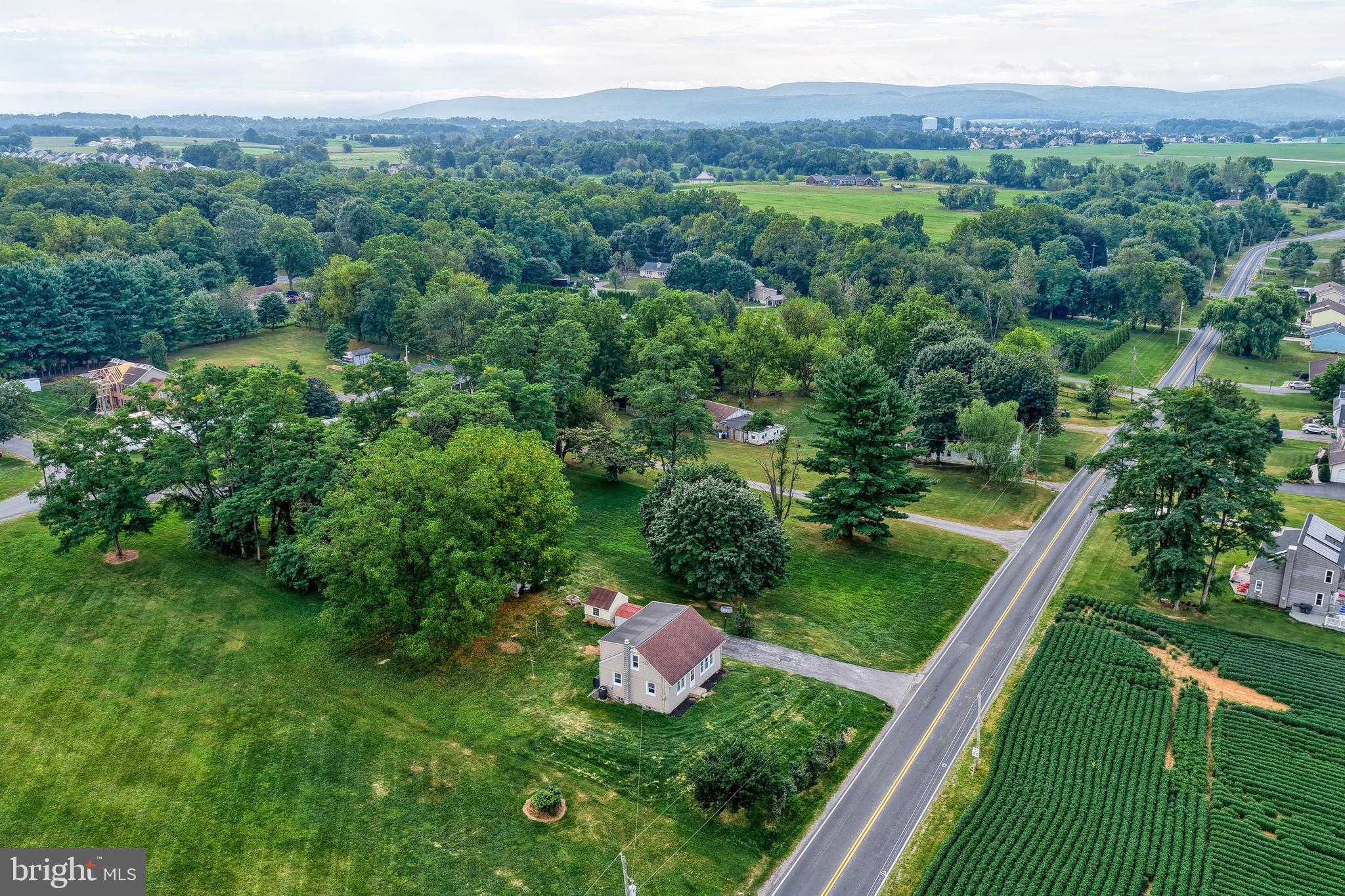 455 Petersburg Road Carlisle, PA 17015 - Photo 69 of 77 a view of a lush green forest with trees and some houses
