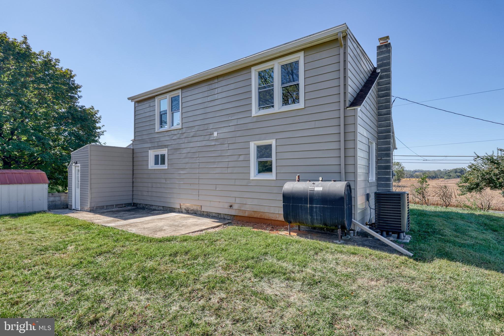 455 Petersburg Road Carlisle, PA 17015 - Photo 9 of 77 a backyard of a house with seating space