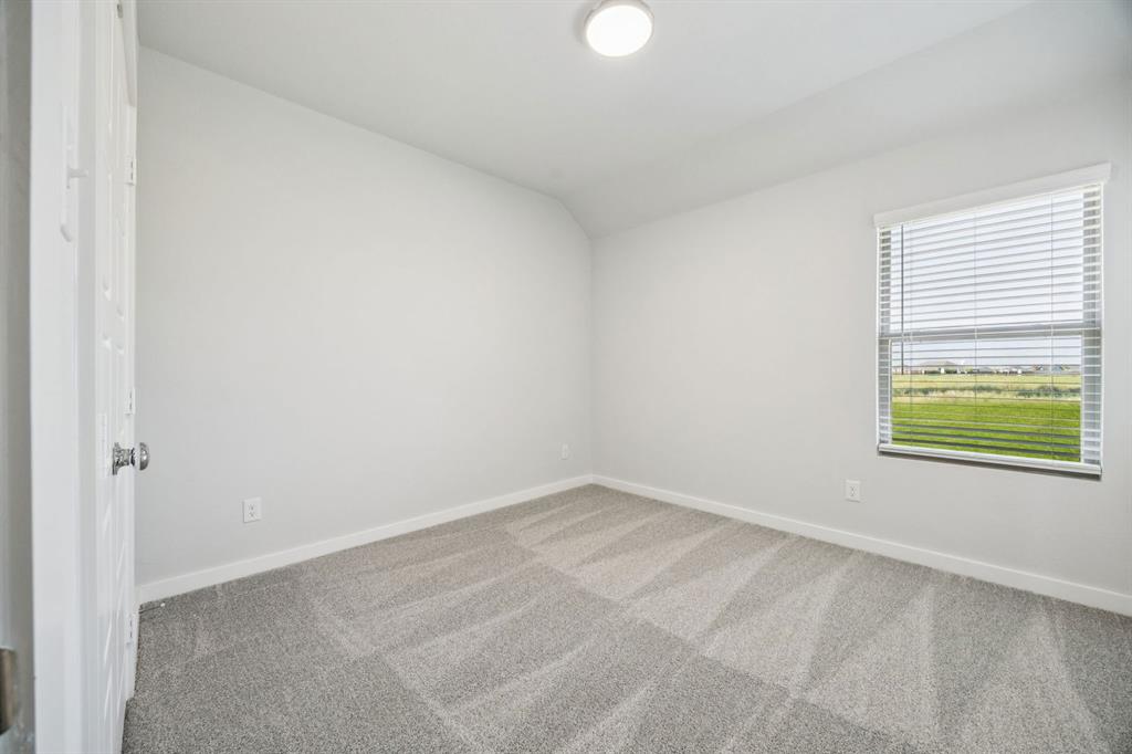 5803 Rushing River Way McKinney, TX 75071 - Photo 28 of 34 Bedroom in the Masters home plan by Trophy Signature Homes – REPRESENTATIVE PHOTO