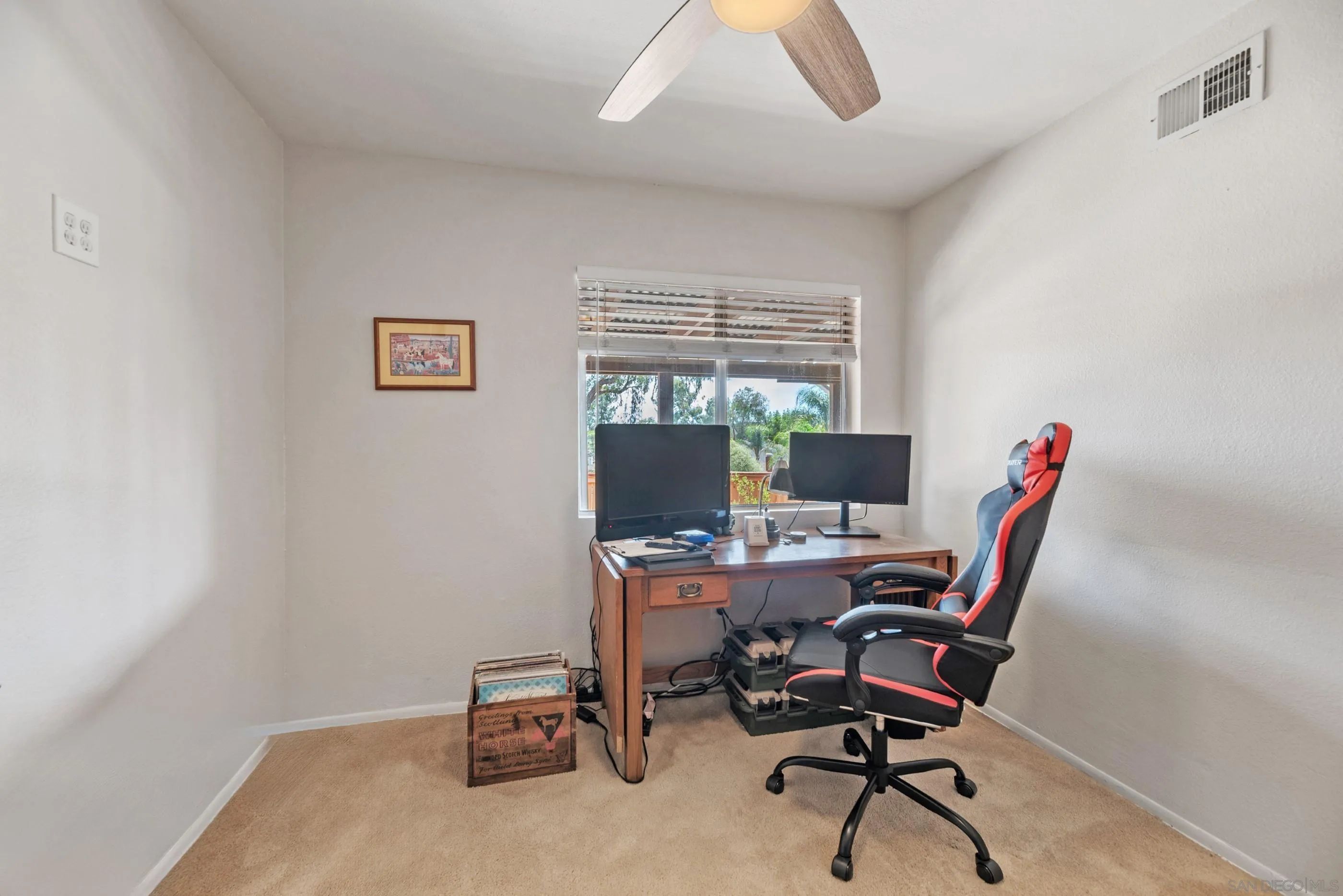 2268 Village Road Escondido, CA 92026 - Photo 19 of 43 a view of a workspace with furniture and a window