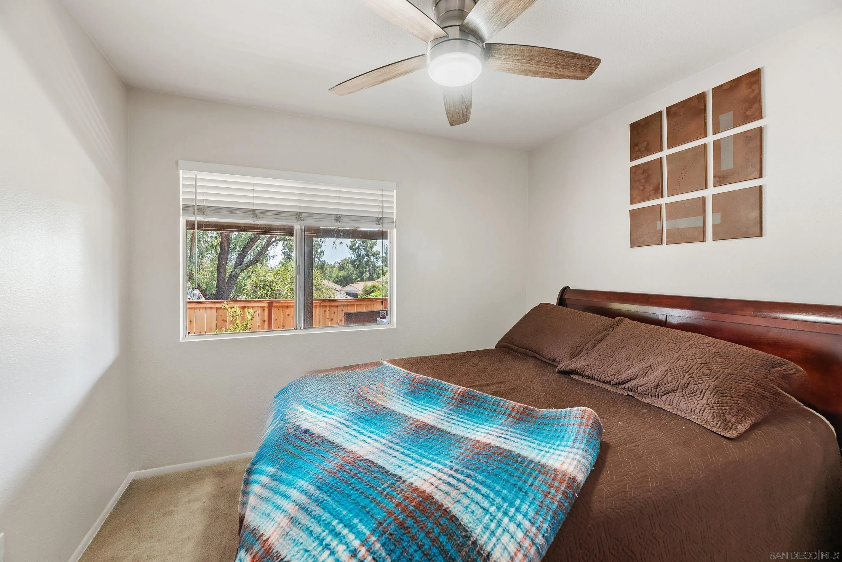2268 Village Road Escondido, CA 92026 - Photo 20 of 43 a bedroom with a bed and a window