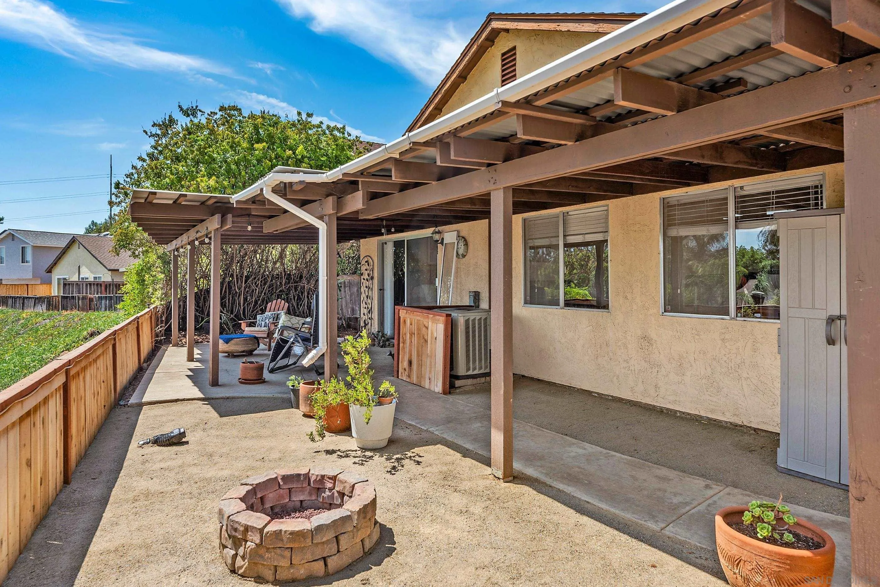 2268 Village Road Escondido, CA 92026 - Photo 29 of 43 a view of a porch with furniture and garden