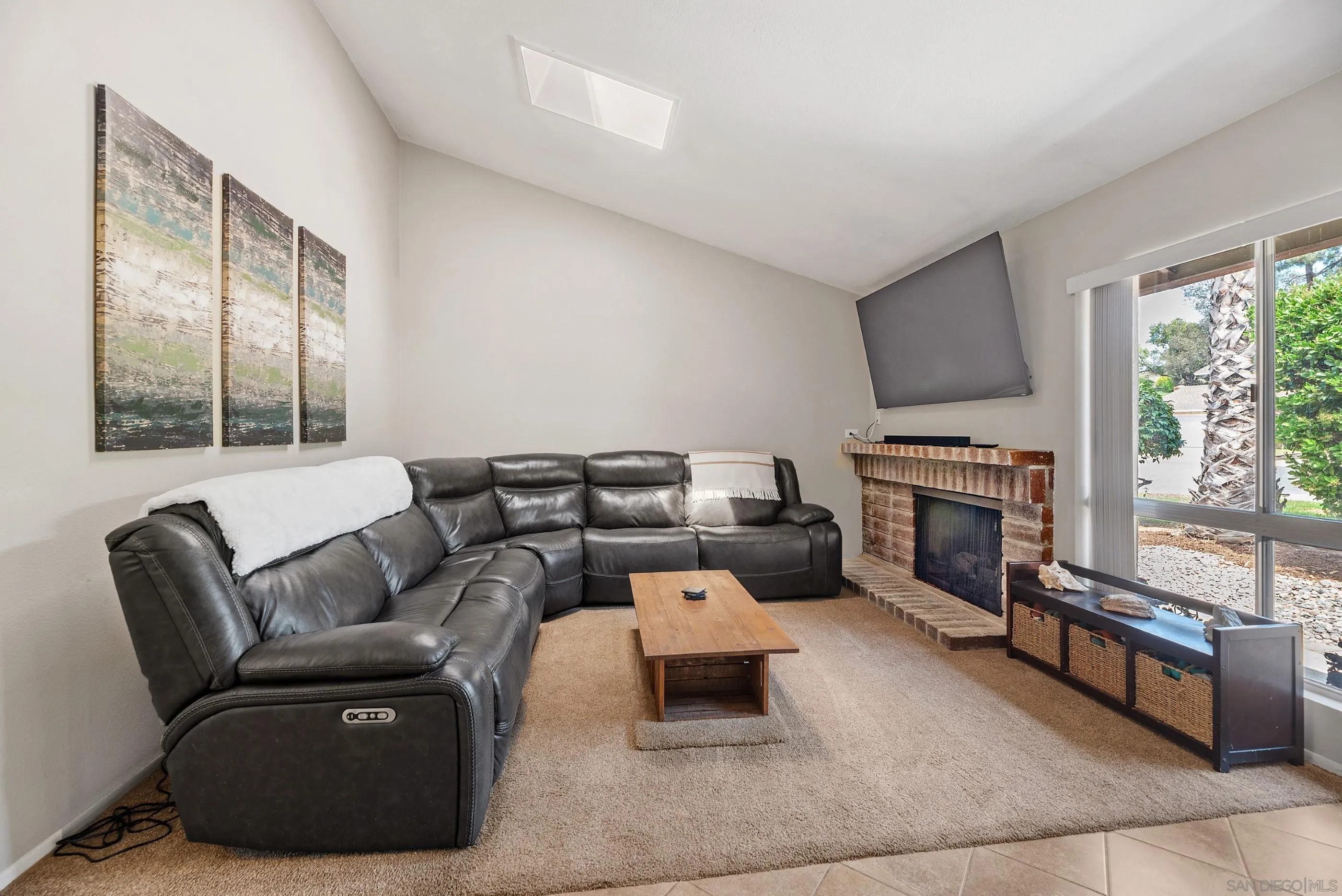 2268 Village Road Escondido, CA 92026 - Photo 3 of 43 a living room with furniture fireplace and flat screen tv