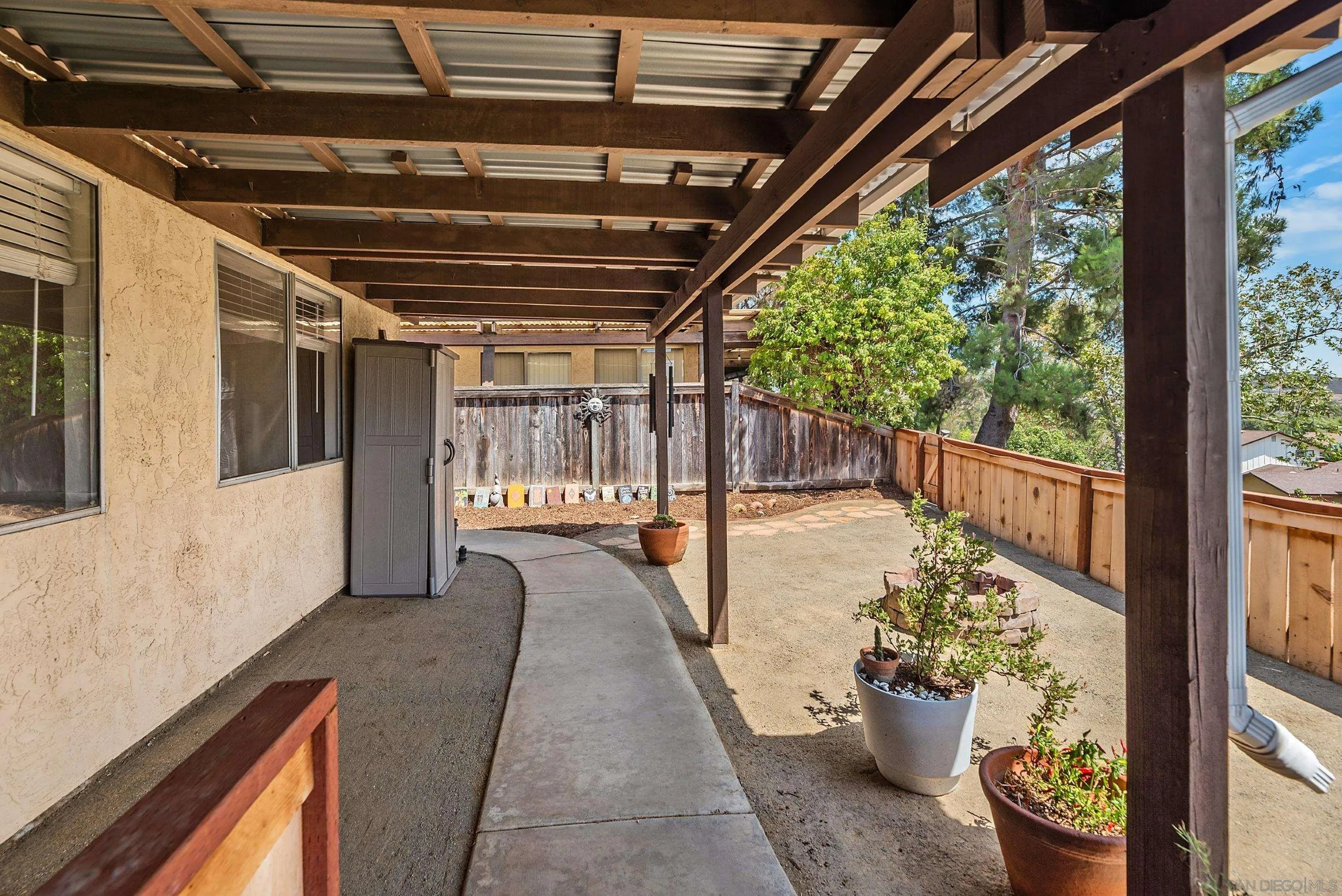 2268 Village Road Escondido, CA 92026 - Photo 31 of 43 a view of a porch with furniture