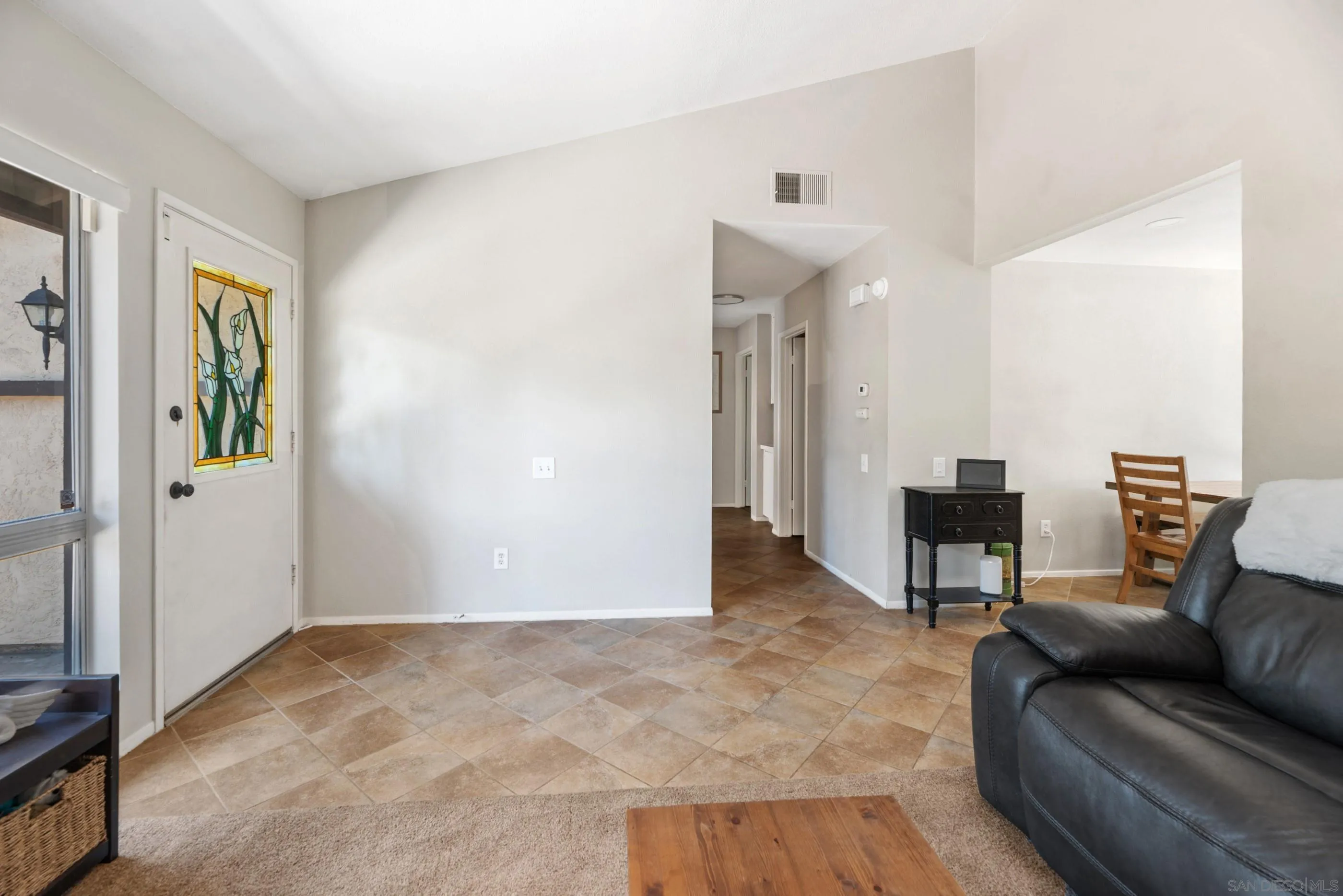 2268 Village Road Escondido, CA 92026 - Photo 6 of 43 a living room with furniture and a dining table