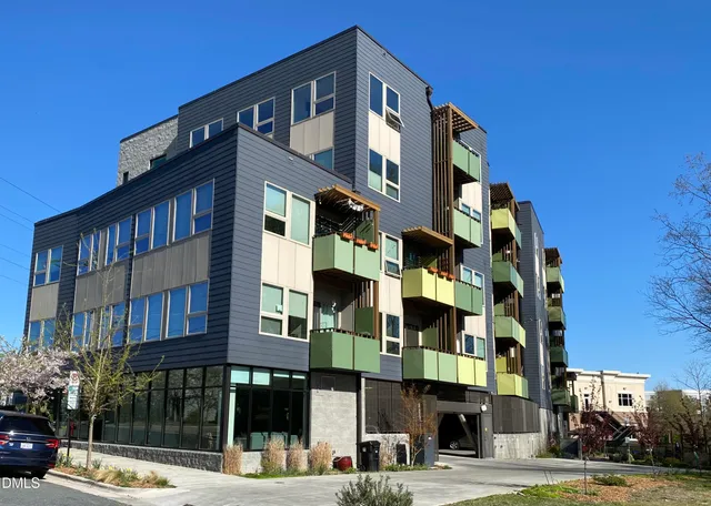 a front view of a building with street view
