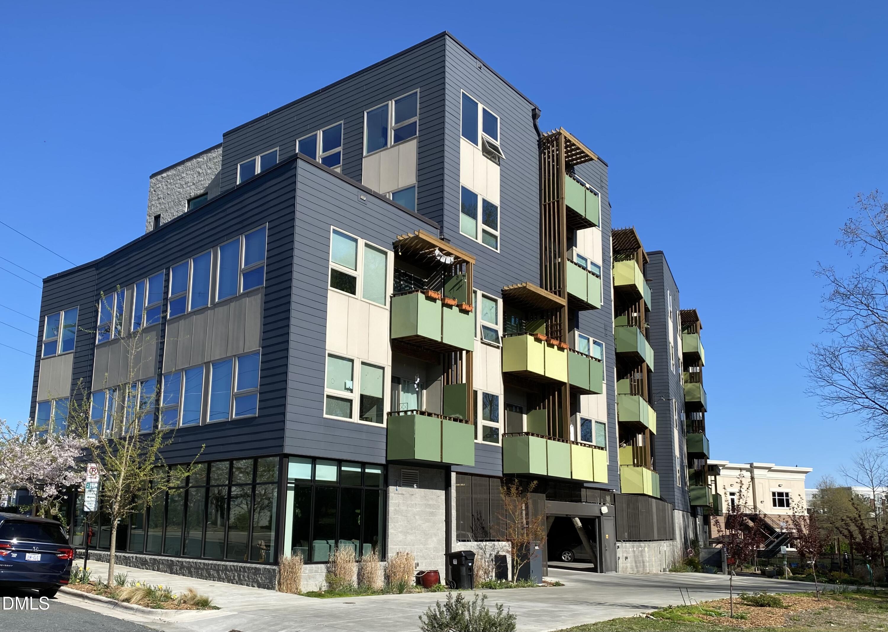 a front view of a building with street view