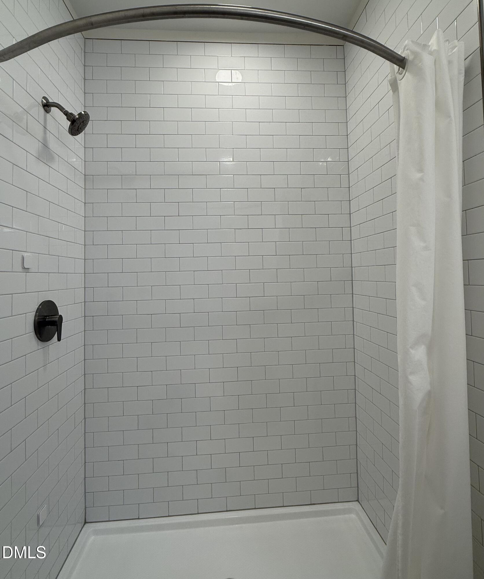 610 Trent Drive, Unit 403 Durham, NC 27705 - Photo 18 of 51 a bathroom with a shower