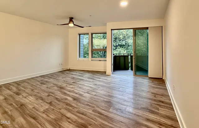 a kitchen with stainless steel appliances a refrigerator sink and stove