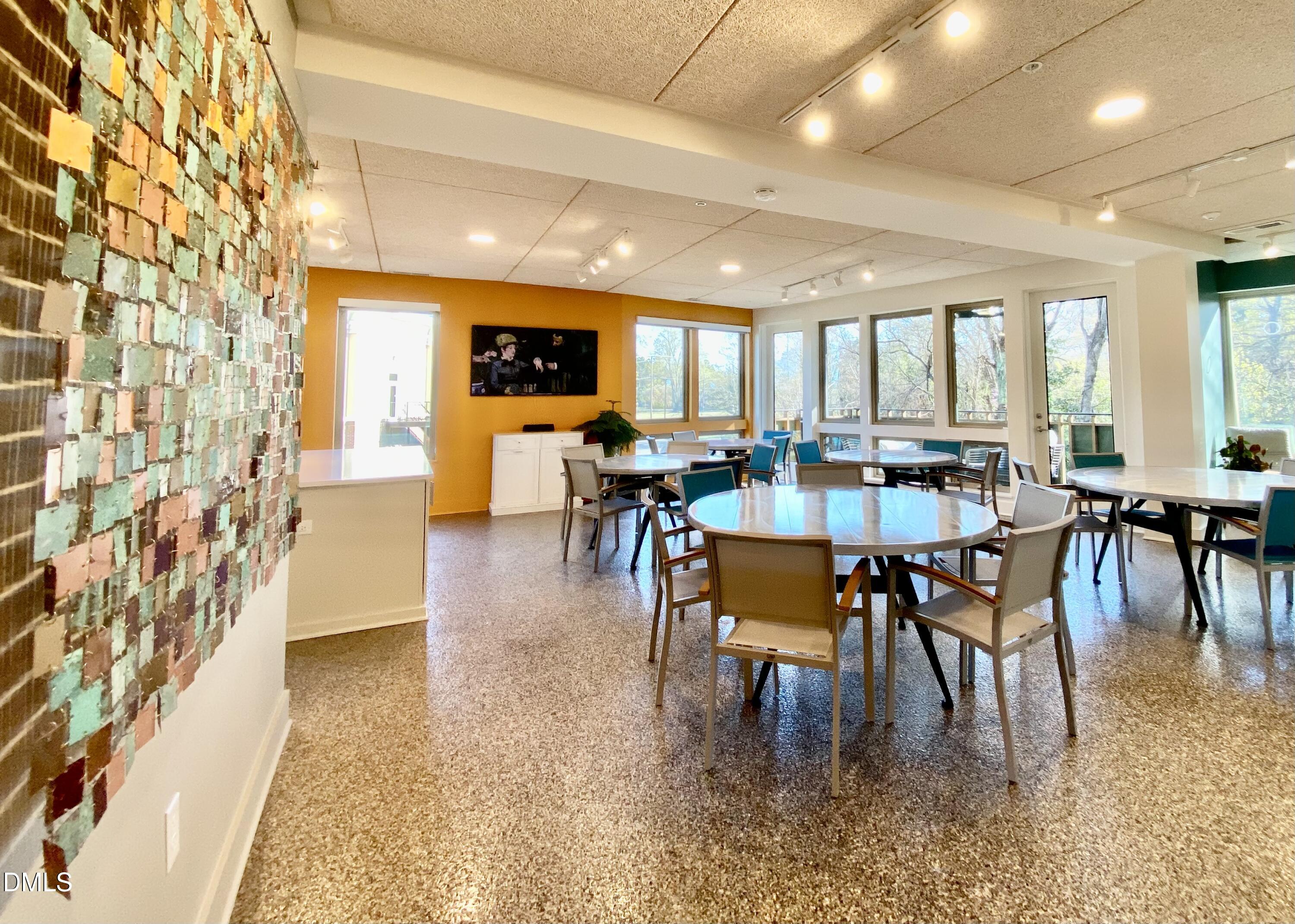 610 Trent Drive, Unit 403 Durham, NC 27705 - Photo 29 of 51 a view of a dining room with furniture