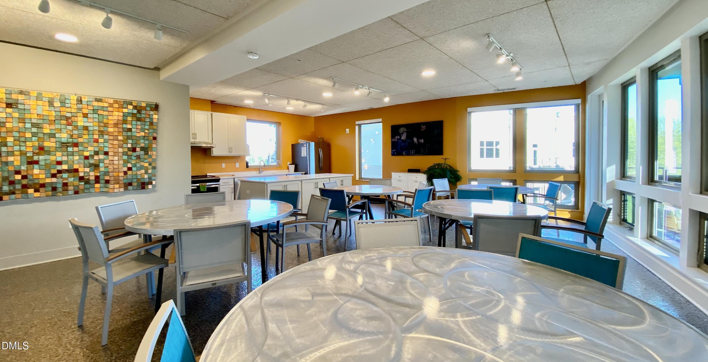 610 Trent Drive, Unit 403 Durham, NC 27705 - Photo 31 of 51 a view of a dining room with furniture window and outside view
