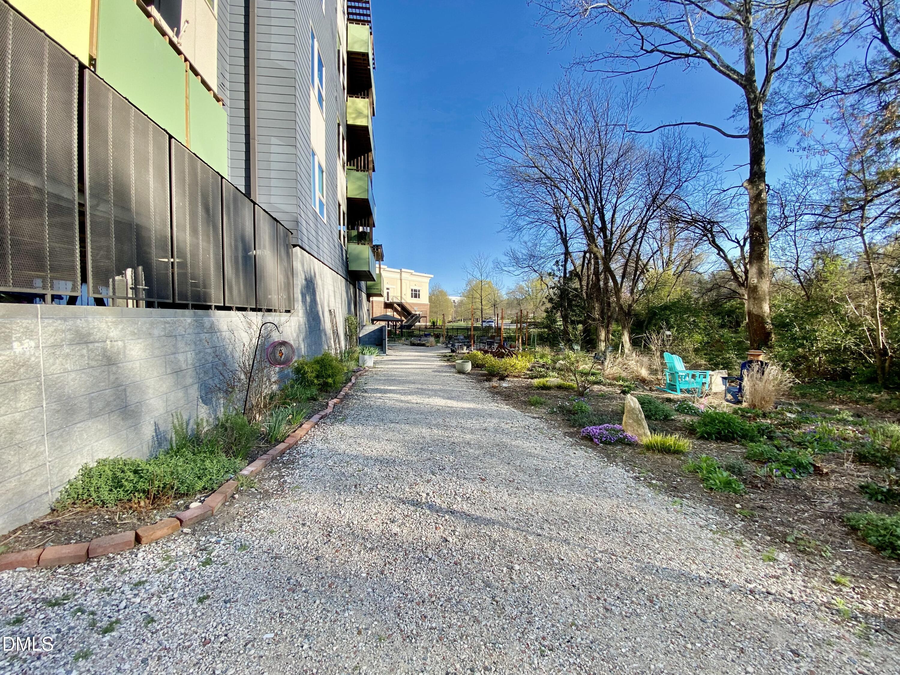 610 Trent Drive, Unit 403 Durham, NC 27705 - Photo 43 of 51 a view of a street with houses on both side