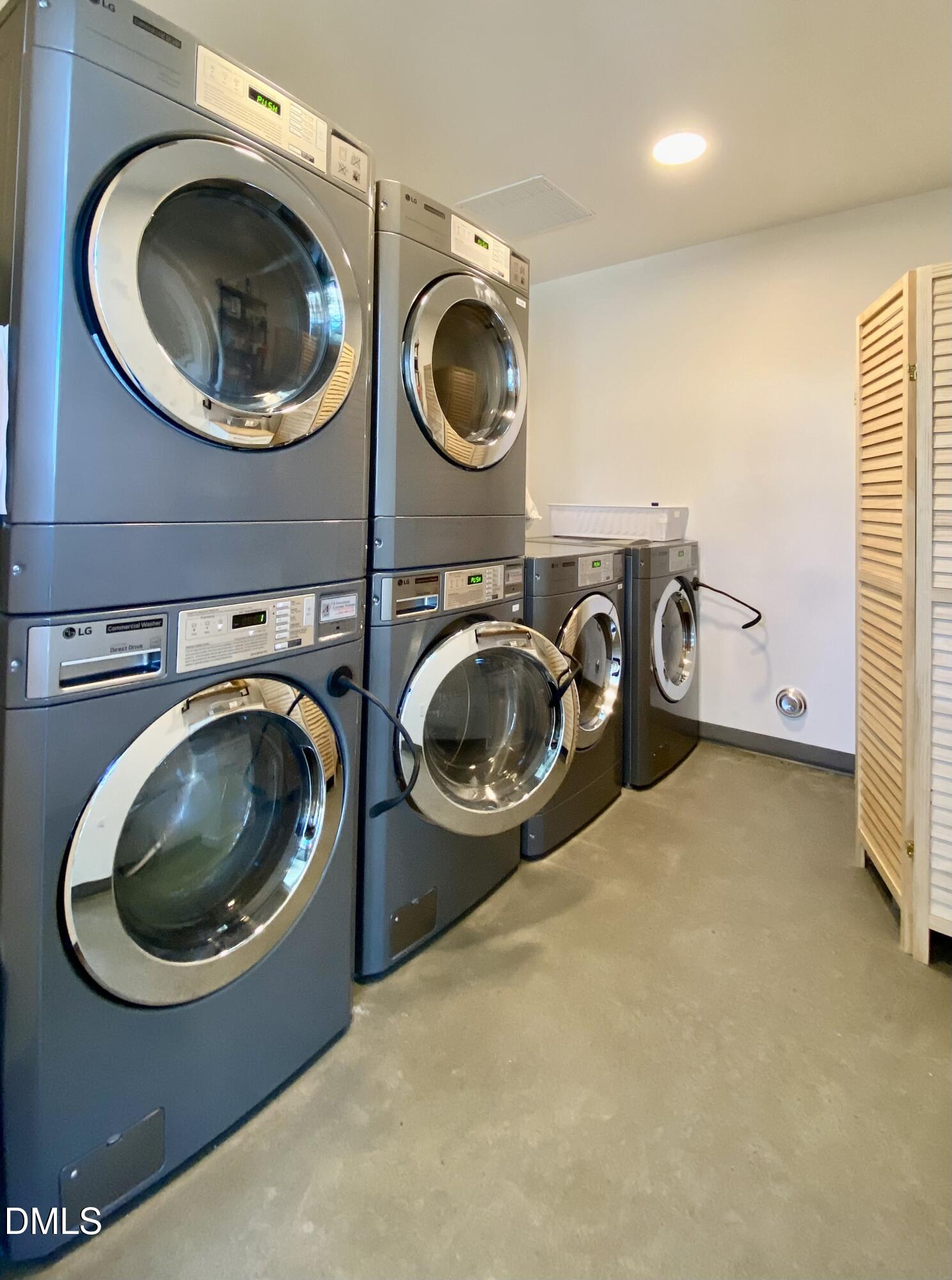 610 Trent Drive, Unit 403 Durham, NC 27705 - Photo 49 of 51 a utility room with sink dryer and washer