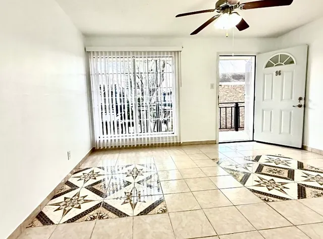 a view of an entryway with a chandelier