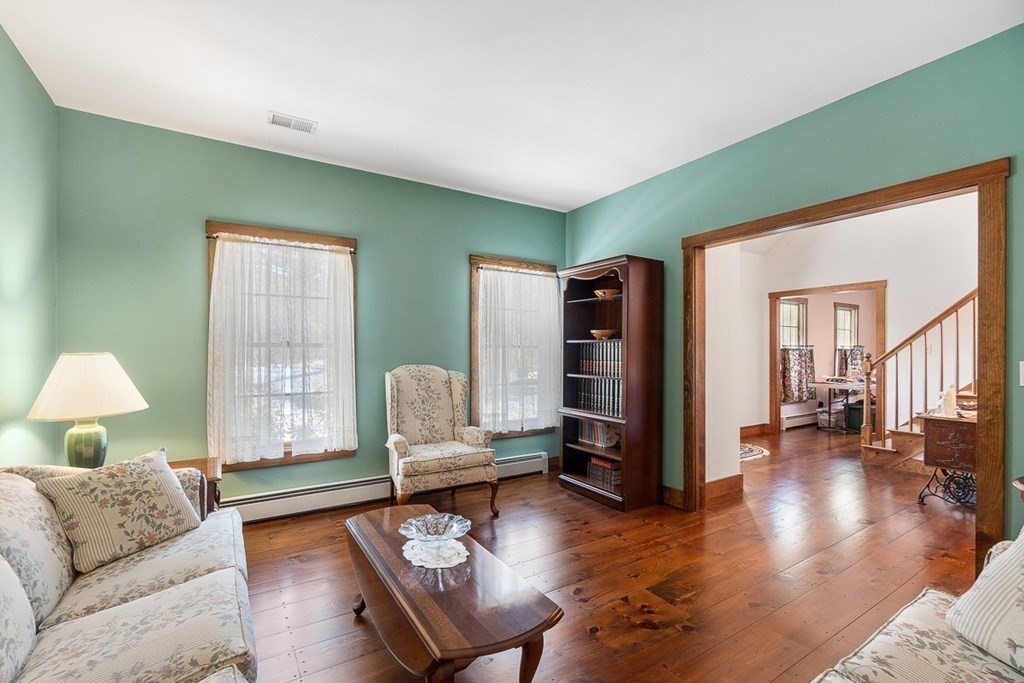 281 Taylor Road Stow, MA 01775 - Photo 11 of 42 a living room with furniture and wooden floor