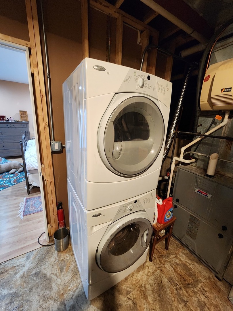 1504 Marshland Way, Unit BASMENT Bull Valley, IL 60098 - Photo 11 of 16 a utility room with dryer and washer