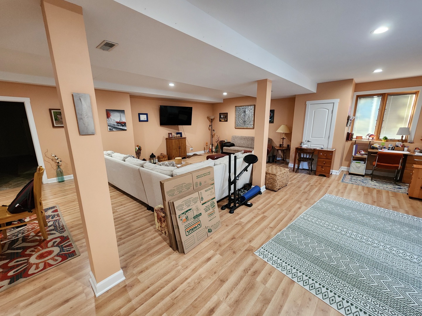 1504 Marshland Way, Unit BASMENT Bull Valley, IL 60098 - Photo 12 of 16 a living room with furniture and a flat screen tv