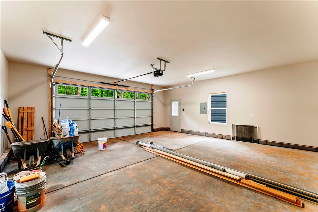 110 Gabriel Way Pickens, SC 29671 - Photo 36 of 48 Ample space for vehicles and storage with a convenient garage door opener.