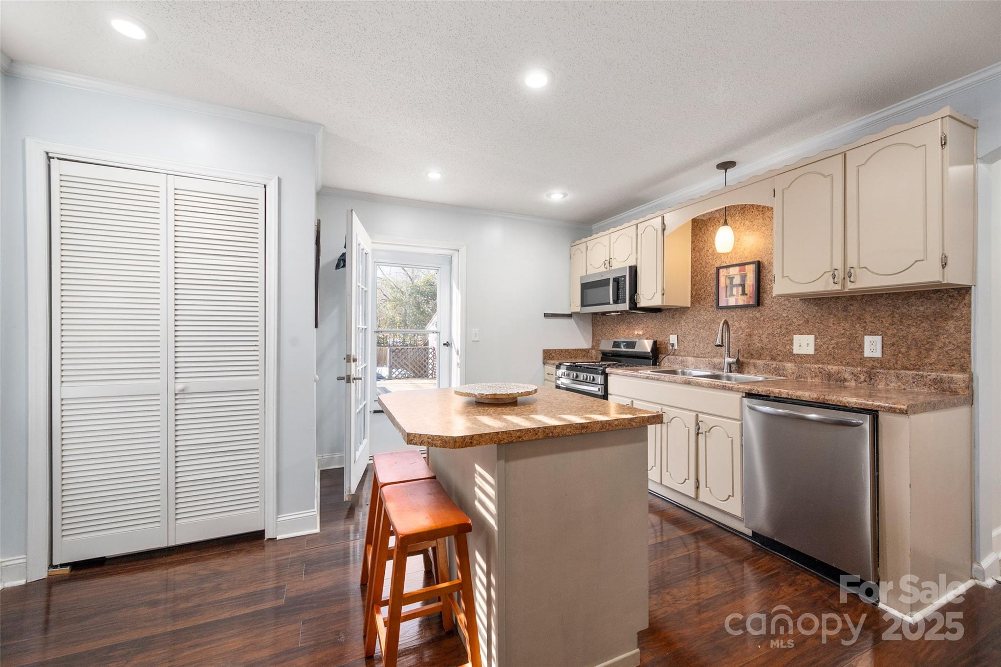 8 Cauthen Street Rock Hill, SC 29730 - Photo 14 of 36 a kitchen with stainless steel appliances granite countertop a sink stove and refrigerator