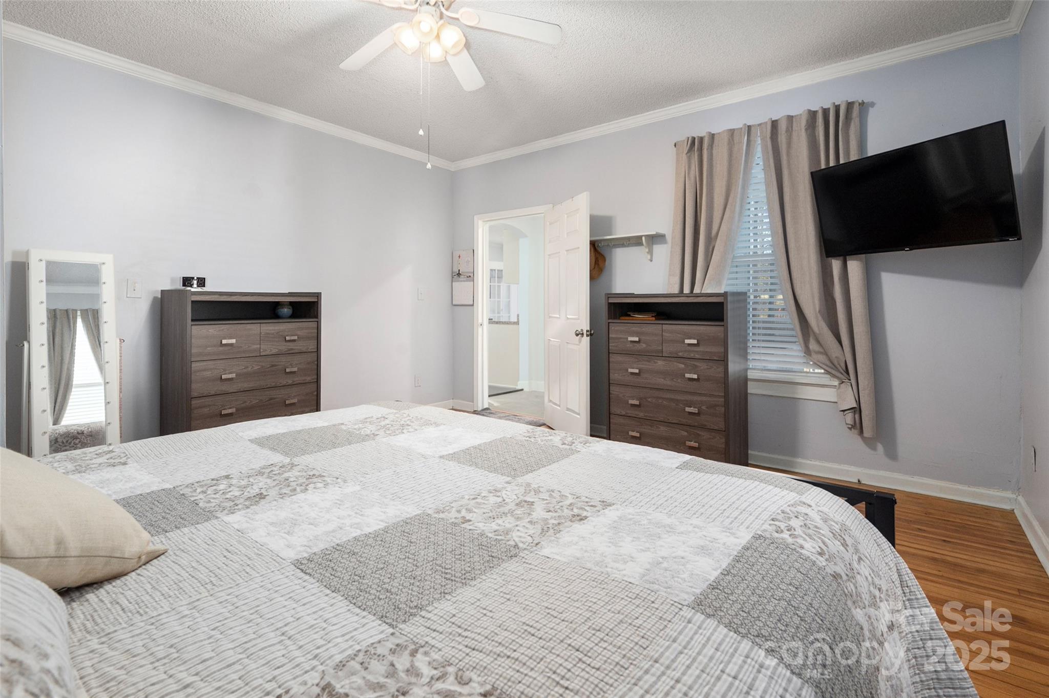 8 Cauthen Street Rock Hill, SC 29730 - Photo 23 of 36 a bedroom with a bed and a flat screen tv