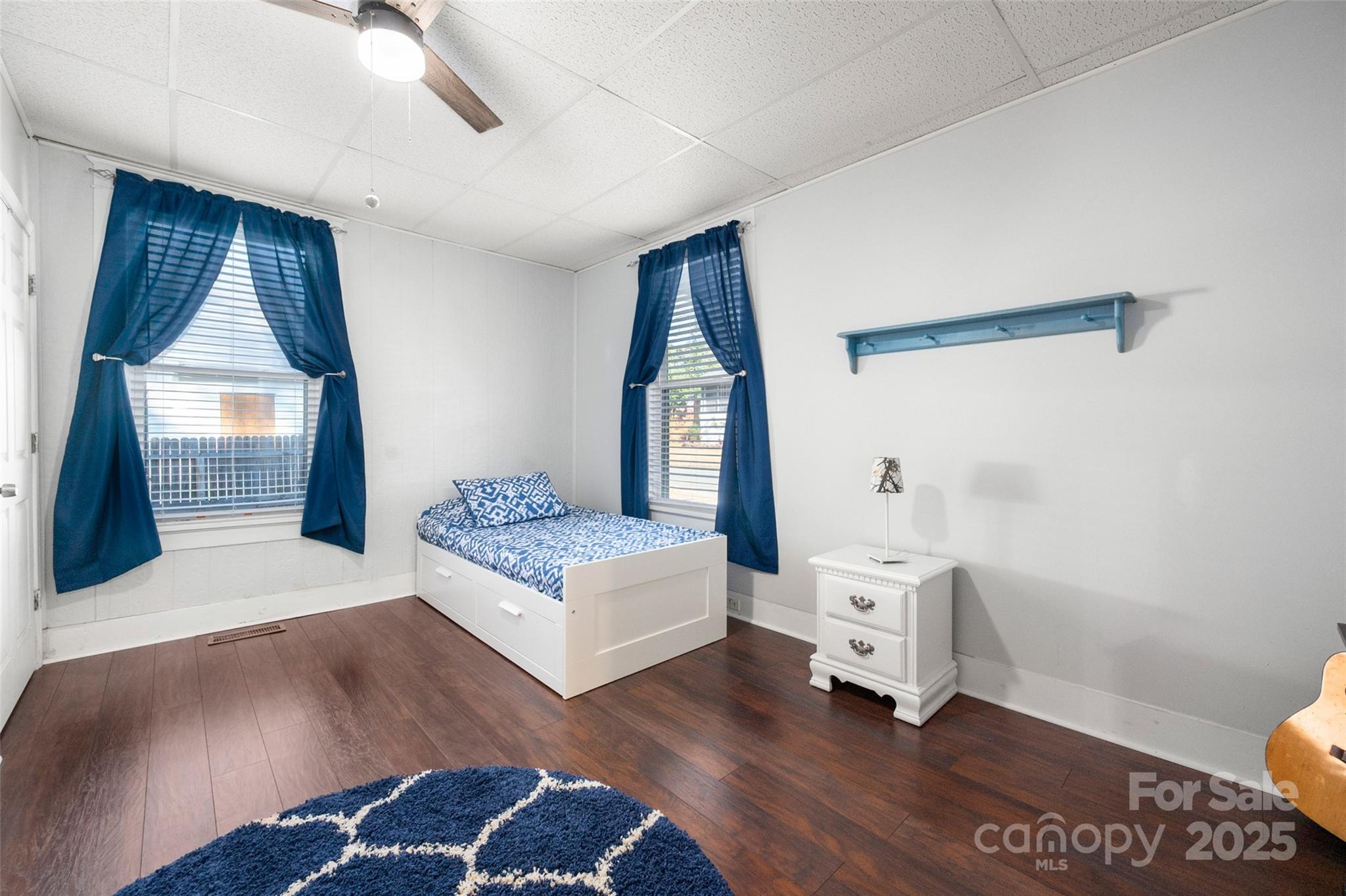 8 Cauthen Street Rock Hill, SC 29730 - Photo 25 of 36 a spacious bedroom with a bed and a mirror on the dresser