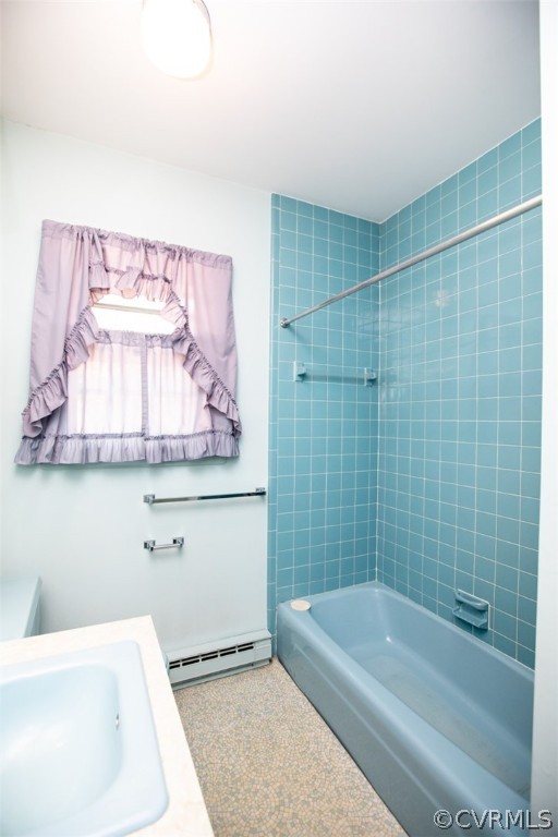 325 Fairgrounds Road Farmville, VA 23901 - Photo 17 of 40 a bathroom with a tub a sink and a shower