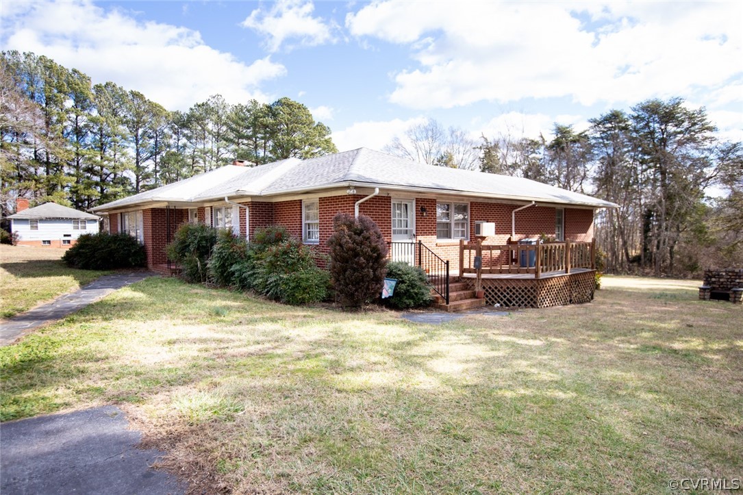 325 Fairgrounds Road Farmville, VA 23901 - Photo 2 of 40 a view of a house with a yard and sitting area