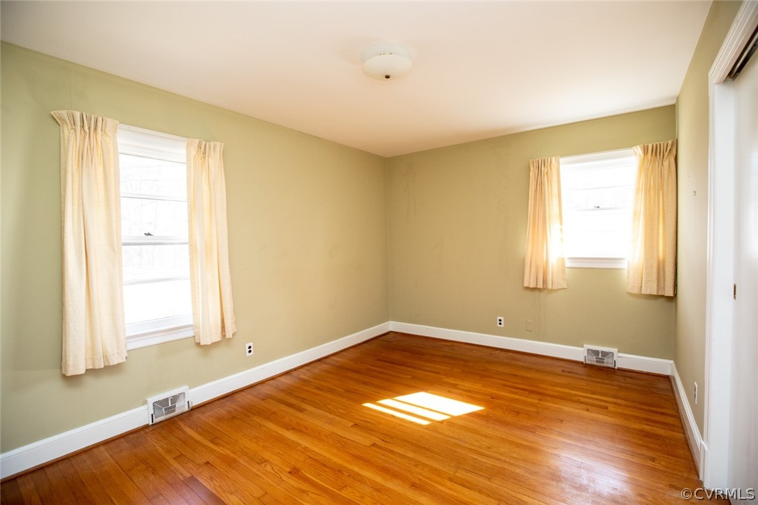 325 Fairgrounds Road Farmville, VA 23901 - Photo 26 of 40 a view of empty room with wooden floor and fan