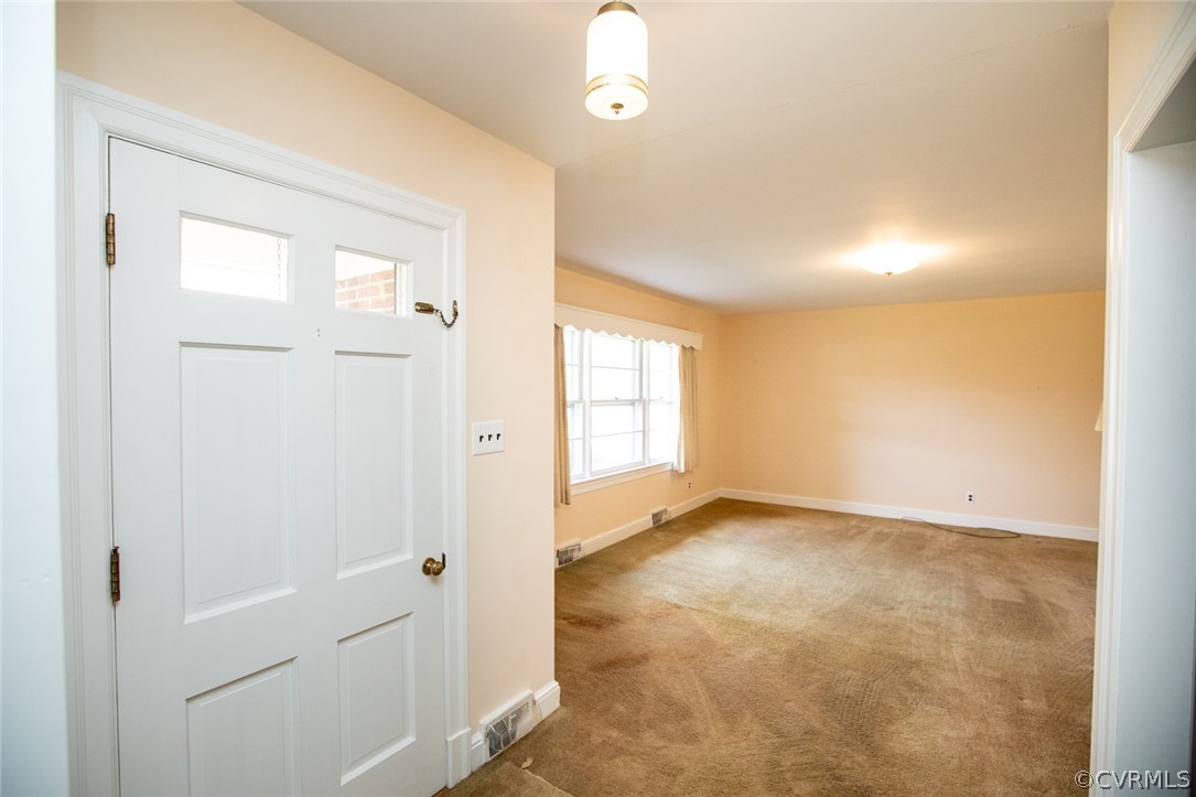 325 Fairgrounds Road Farmville, VA 23901 - Photo 3 of 40 a view of an empty room with a window